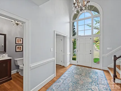 a view of livingroom with hardwood floor and hallway
