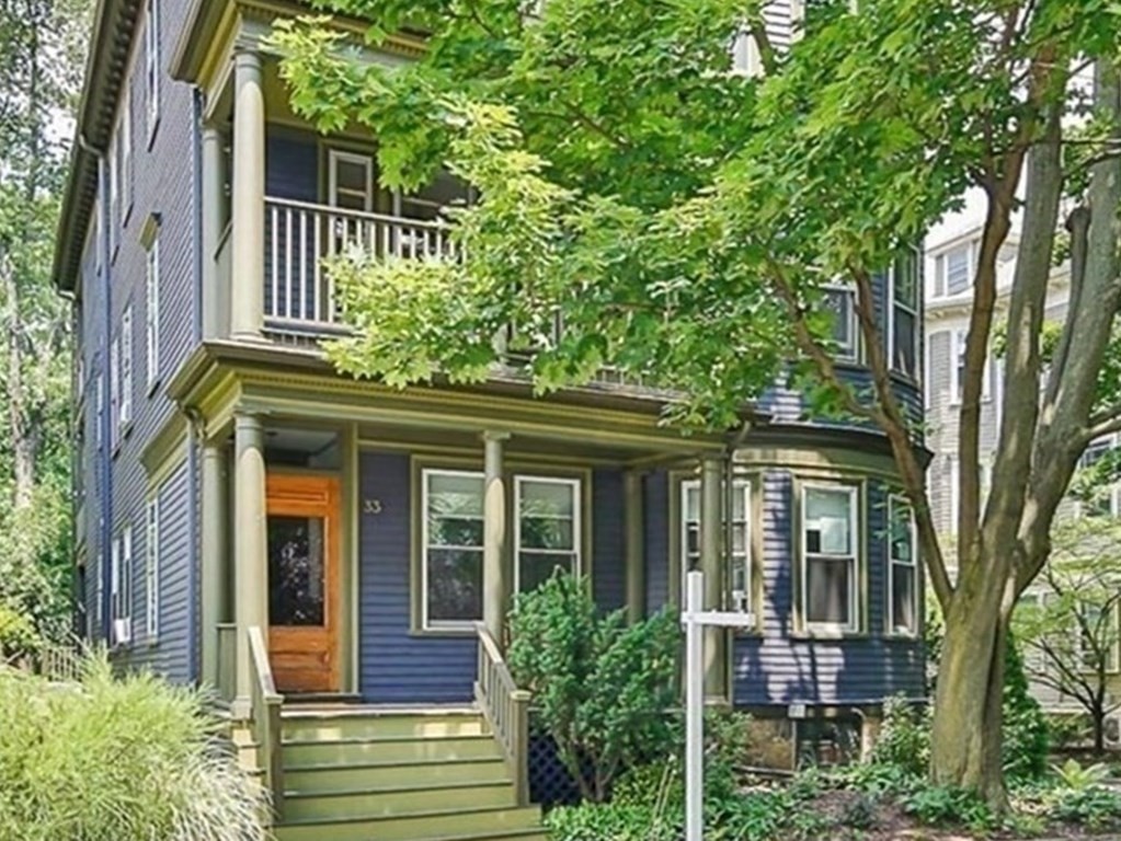 33 Stanton Road, Unit 2 Brookline, MA 02445 - Photo 1 of 19 front view of a house with a tree