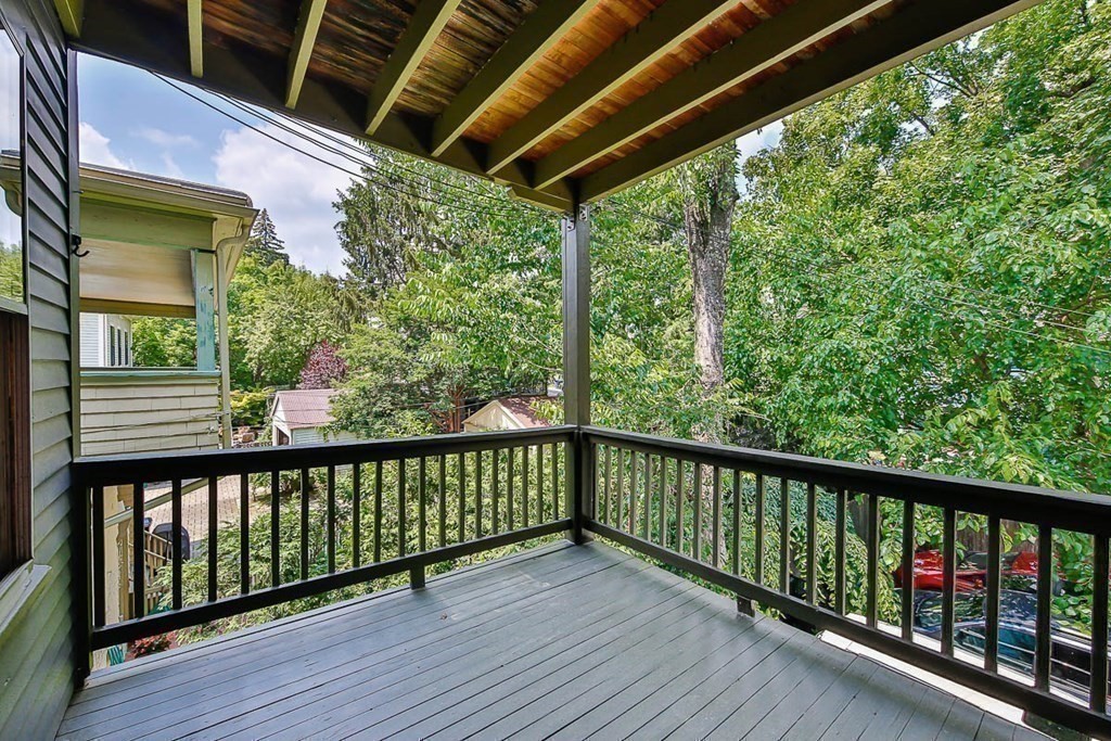 33 Stanton Road, Unit 2 Brookline, MA 02445 - Photo 13 of 19 a view of a balcony with wooden floor
