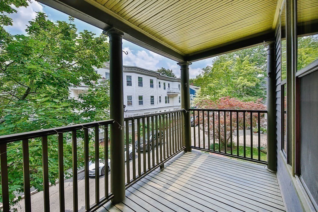 33 Stanton Road, Unit 2 Brookline, MA 02445 - Photo 7 of 19 a view of a wooden deck
