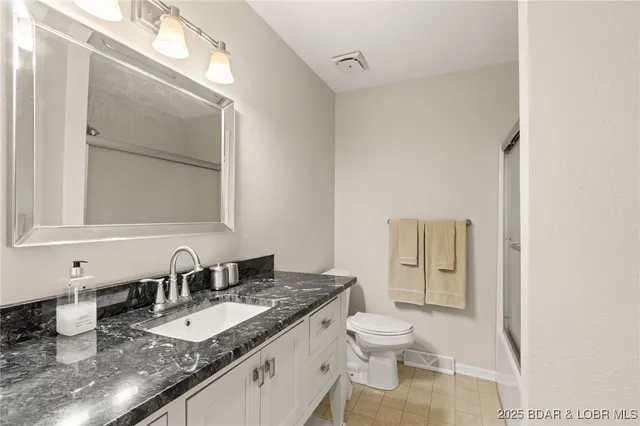 $299,900 | 7 Lone Timber, Unit 1B, Four Seasons, MO 65049