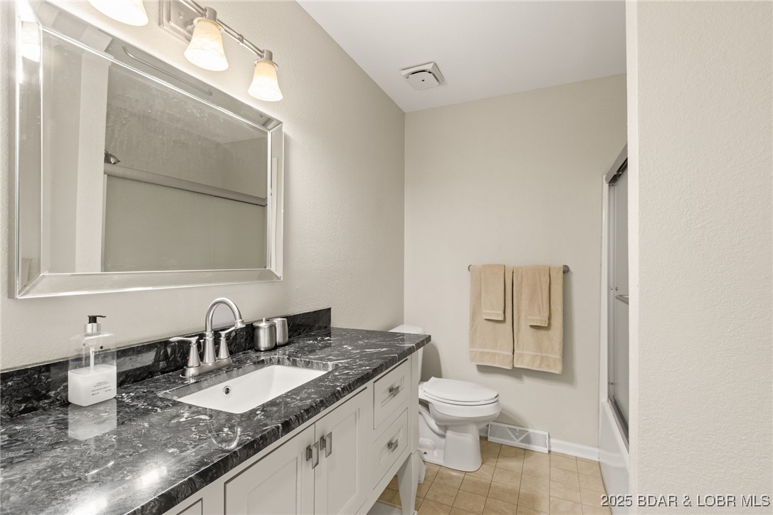 7 Lone Timber, Unit 1B Four Seasons, MO 65049 - Photo 27 of 38 Hall Bath