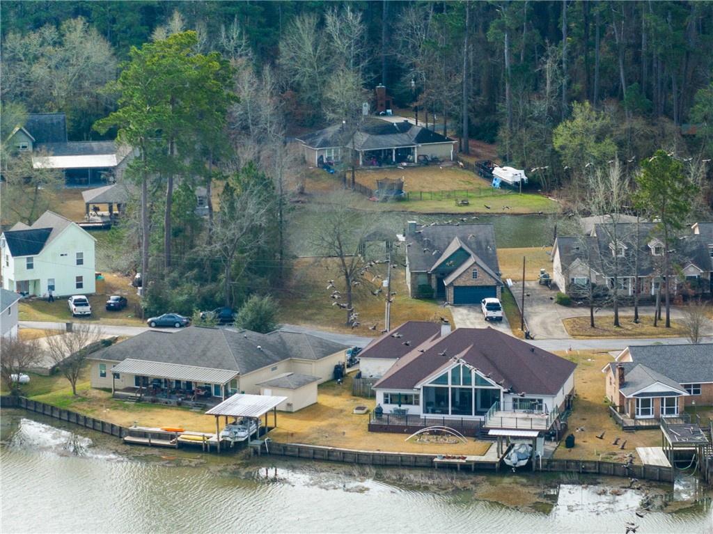 70 Lakeside Drive Trinity, TX 75862 - Photo 31 of 34 an aerial view of a house with swimming pool and a yard