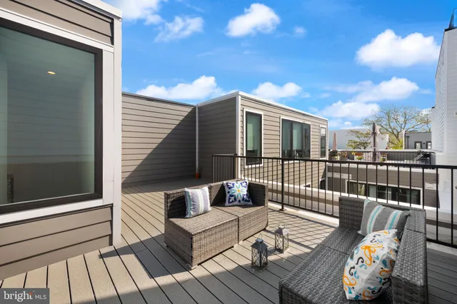 a view of a terrace with seating area