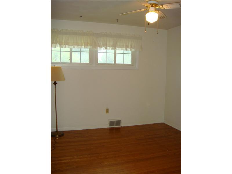879 Clarksville Road Hermitage, PA 16148 - Photo 8 of 20 Bedroom. Bedroom 3 also w/ Hardwood & Newer Windows