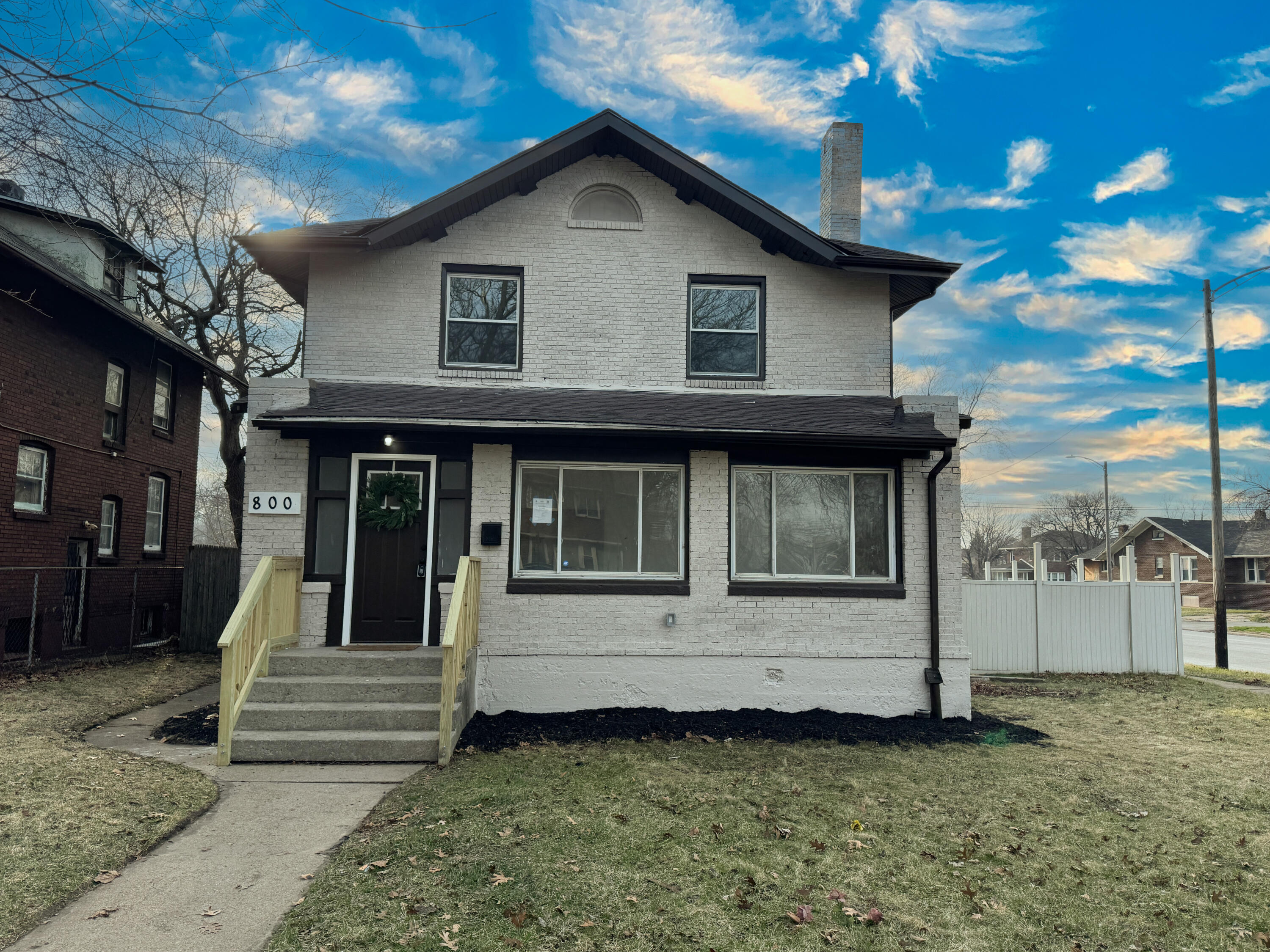 800 Buchanan Street Gary, IN 46402 - Photo 1 of 29 a view of a house with a yard