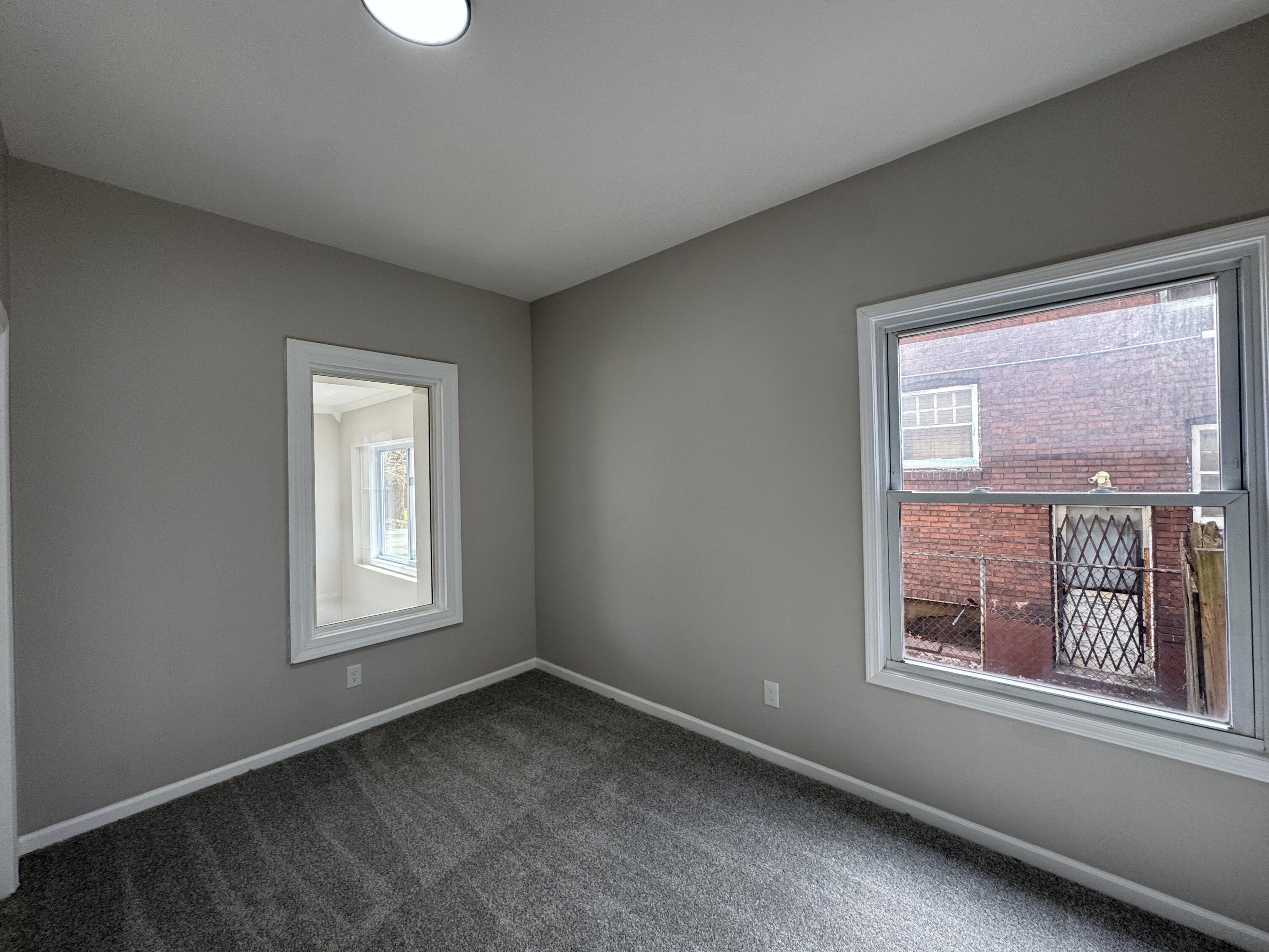 800 Buchanan Street Gary, IN 46402 - Photo 16 of 29 a view of an empty room with a window
