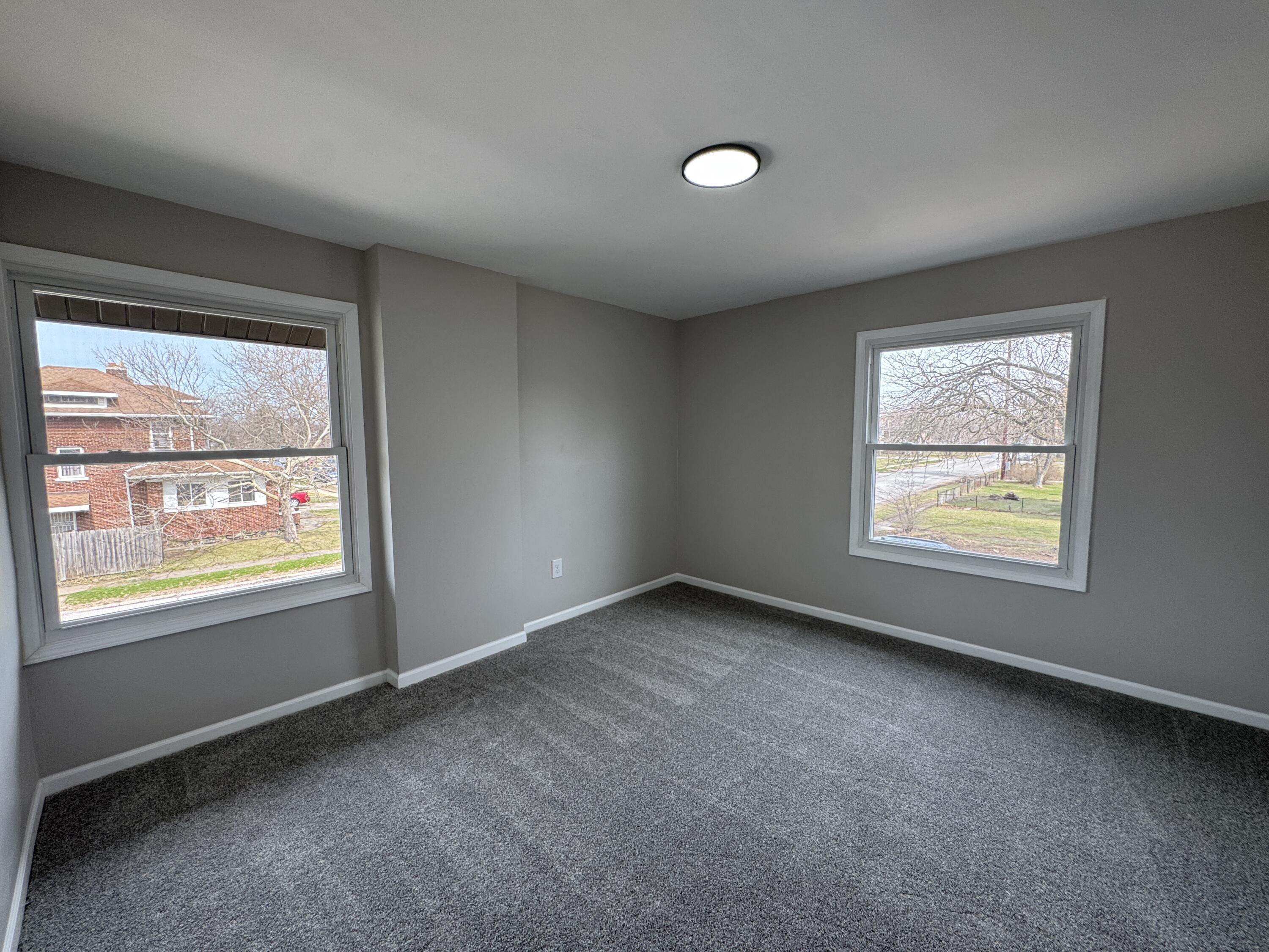 800 Buchanan Street Gary, IN 46402 - Photo 23 of 29 an empty room with windows