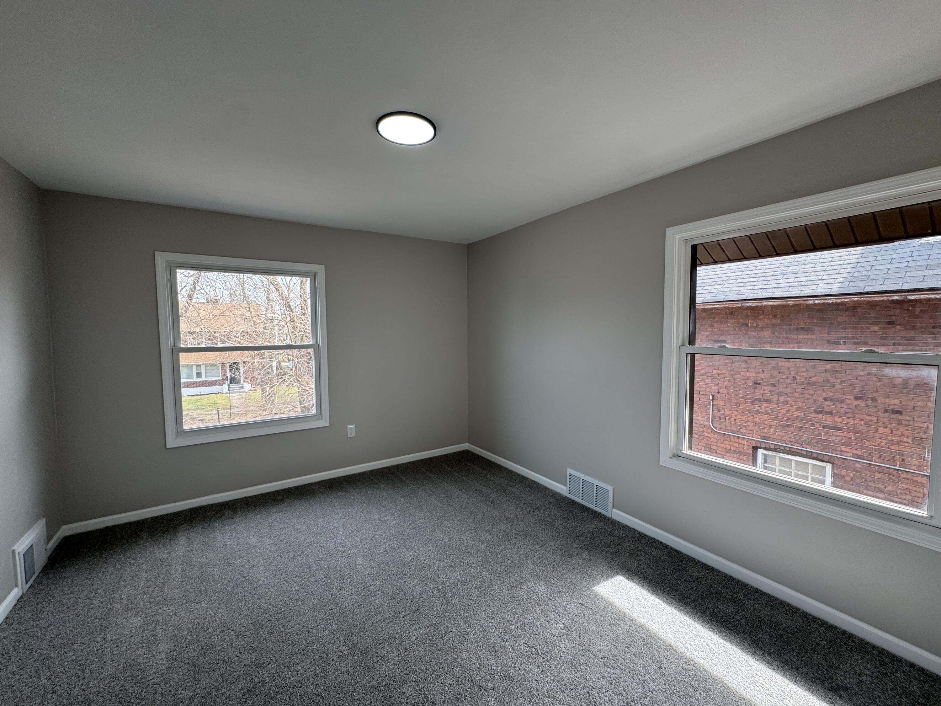 800 Buchanan Street Gary, IN 46402 - Photo 24 of 29 an empty room with a window