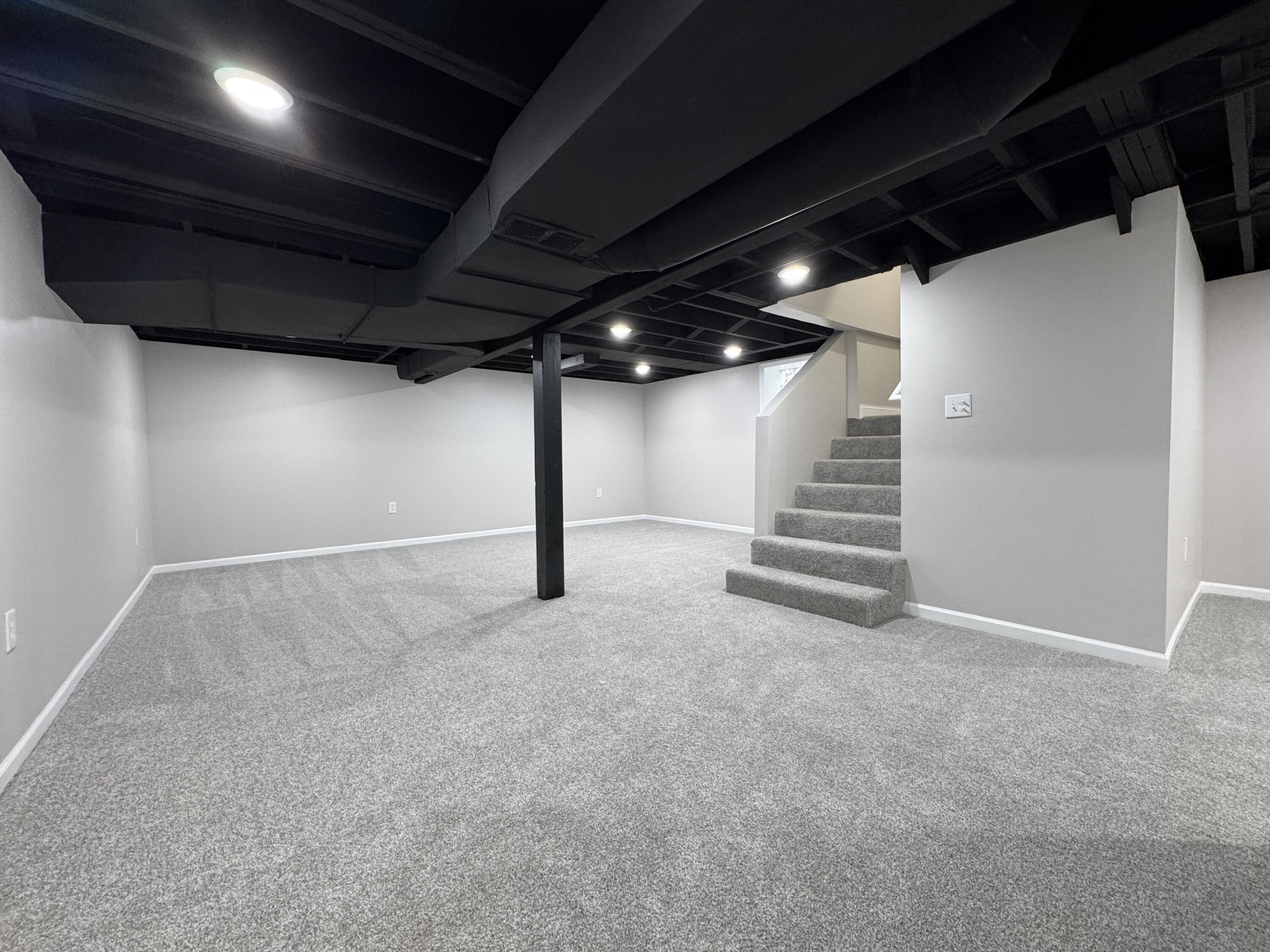 800 Buchanan Street Gary, IN 46402 - Photo 27 of 29 a view of an empty room with wooden walls