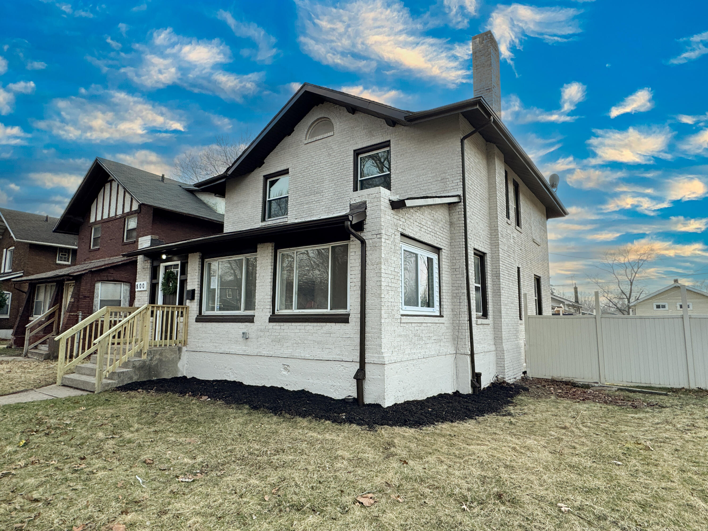 800 Buchanan Street Gary, IN 46402 - Photo 3 of 29 a view of a house with a yard