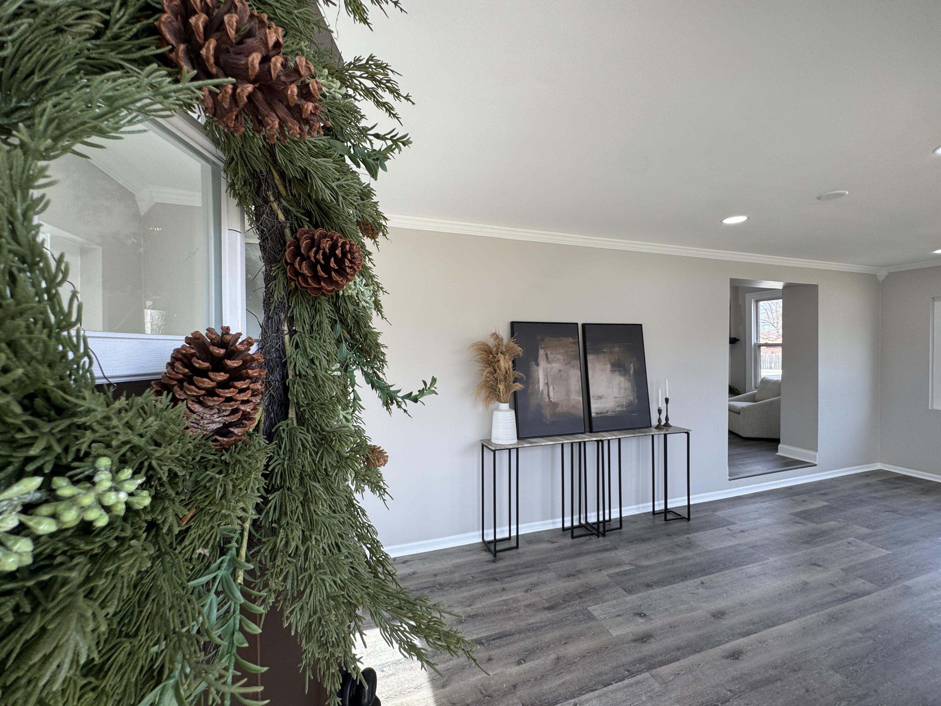 800 Buchanan Street Gary, IN 46402 - Photo 4 of 29 an empty room with wooden floor and a window
