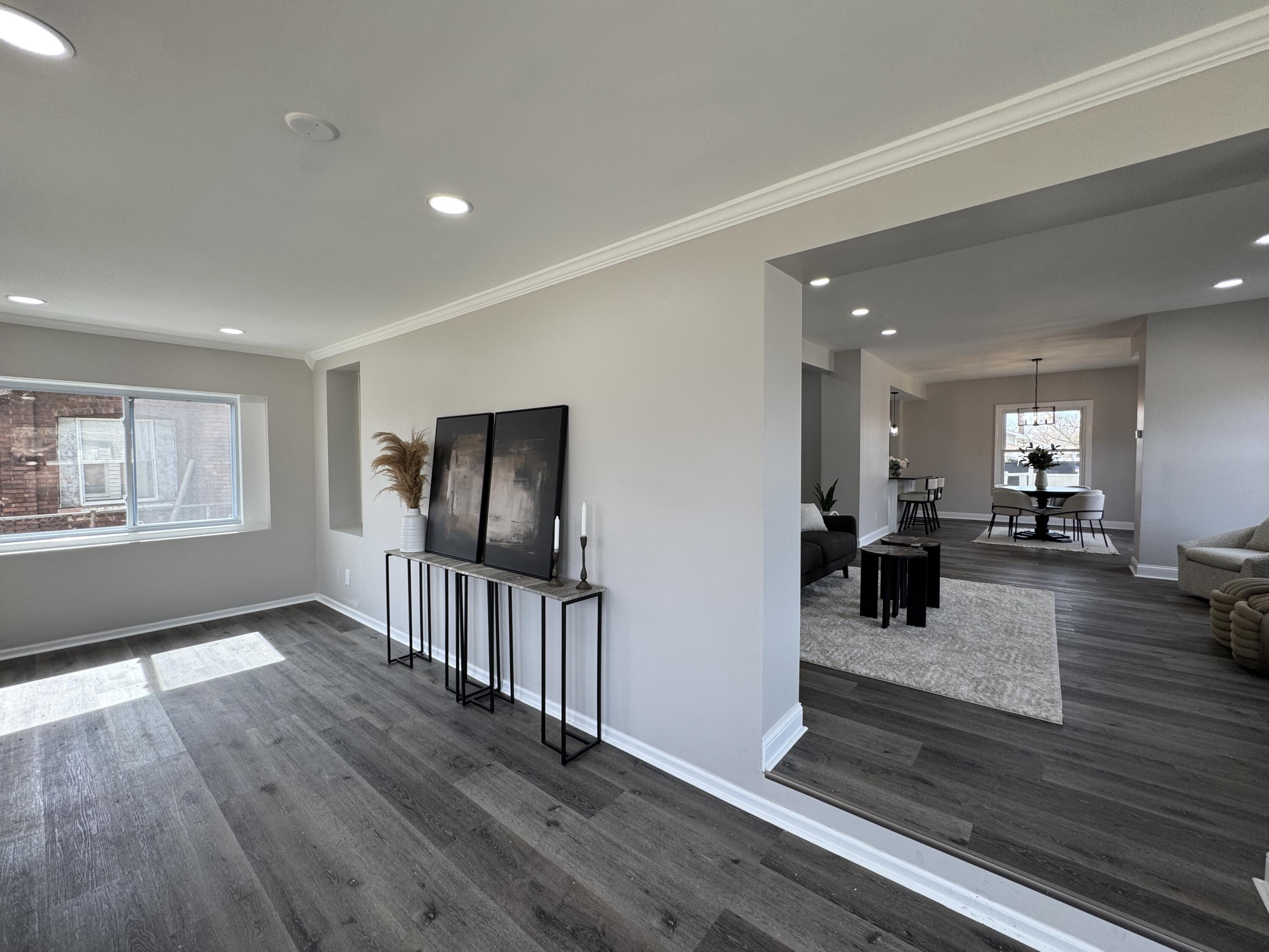 800 Buchanan Street Gary, IN 46402 - Photo 5 of 29 a living room with furniture and a wooden floor