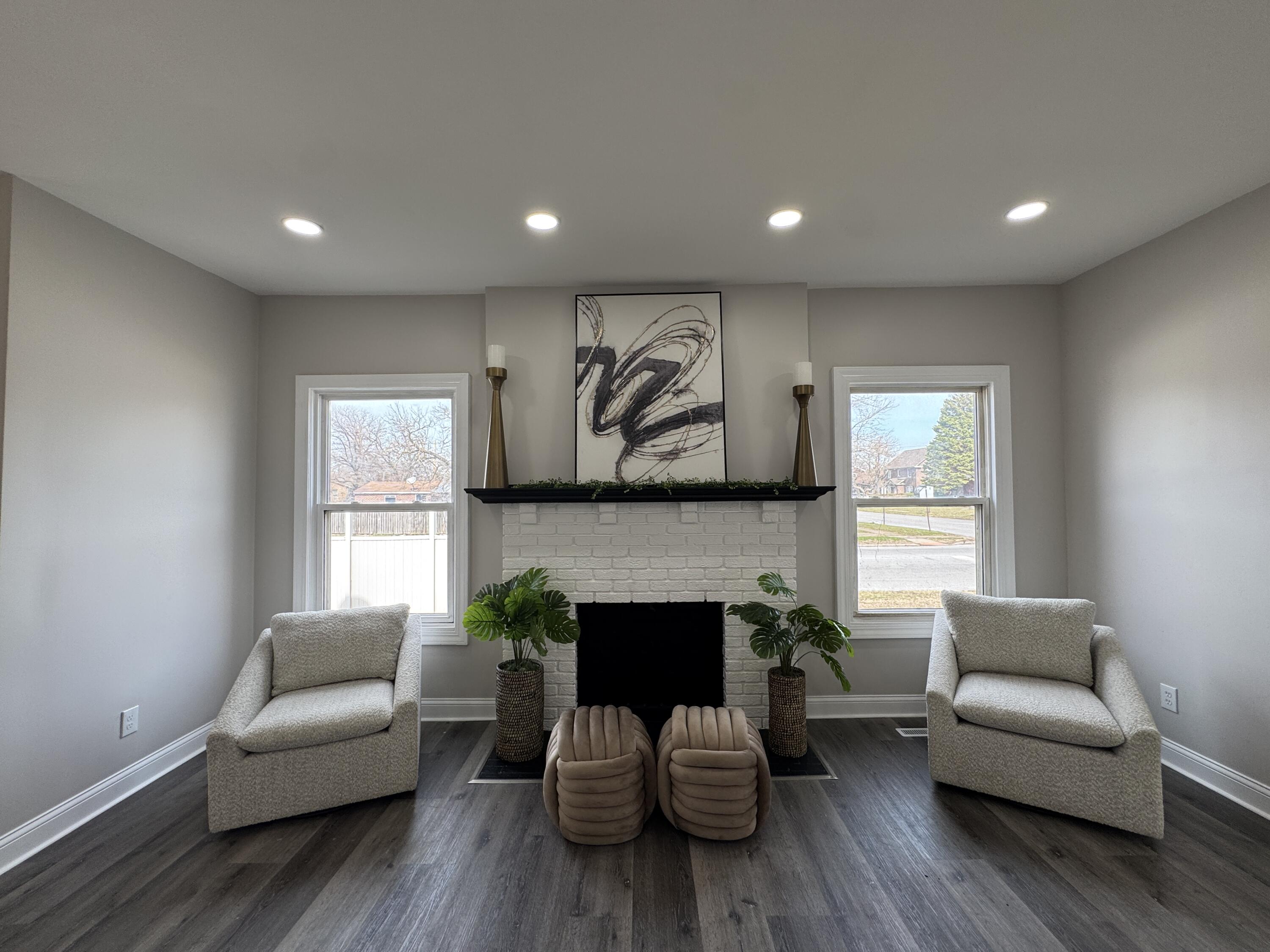 800 Buchanan Street Gary, IN 46402 - Photo 7 of 29 a living room with furniture a window and a fireplace