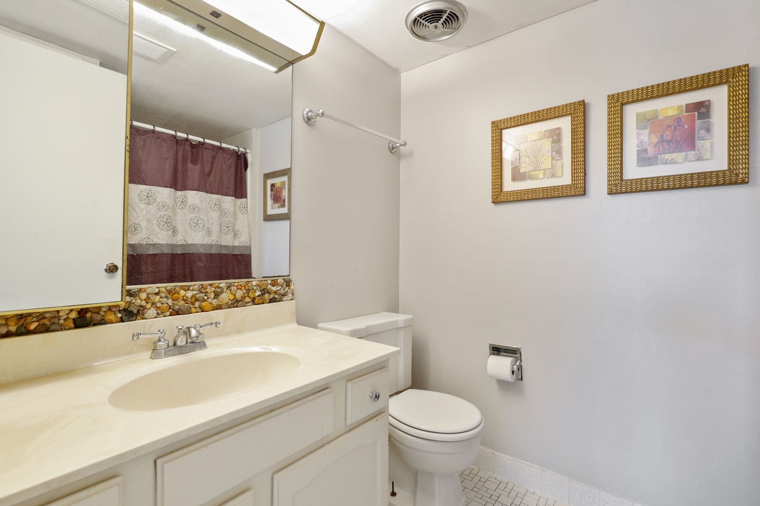3704 215th Street, Unit 205 Matteson, IL 60443 - Photo 11 of 16 a bathroom with a sink toilet and a mirror