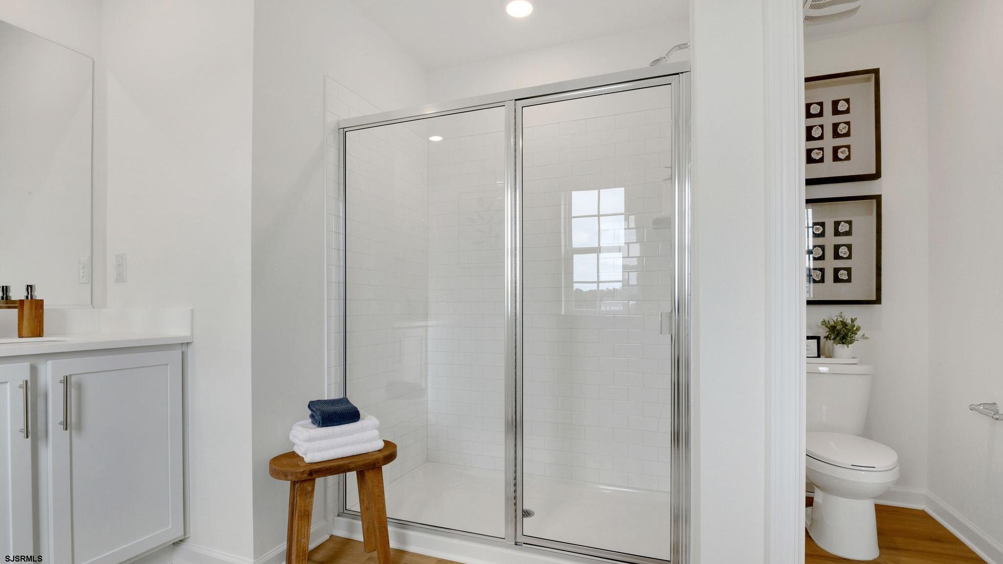 224 Daytona Road Egg Harbor Township, NJ 08234 - Photo 31 of 31 a bathroom with a shower a toilet and a sink