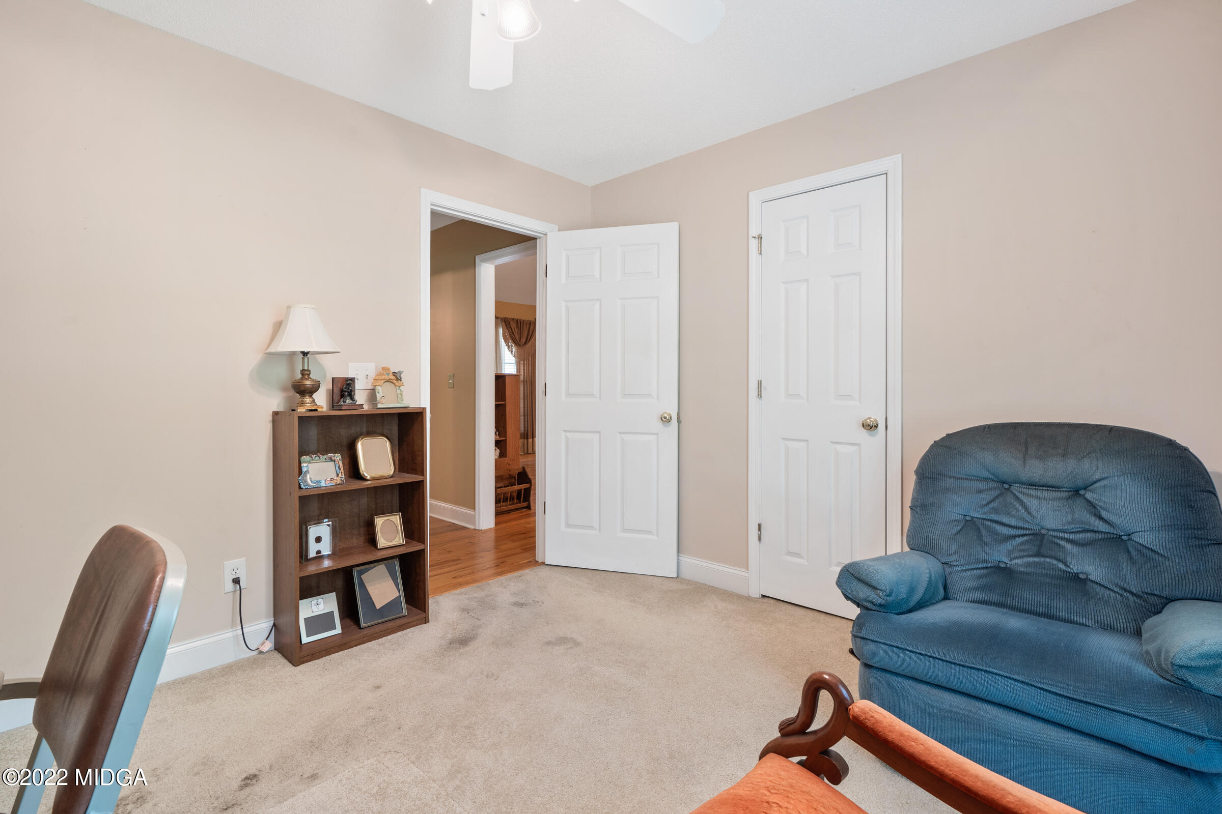 188 Whitaker Road Macon, GA 31211 - Photo 11 of 32 a living room with furniture and a wooden floor