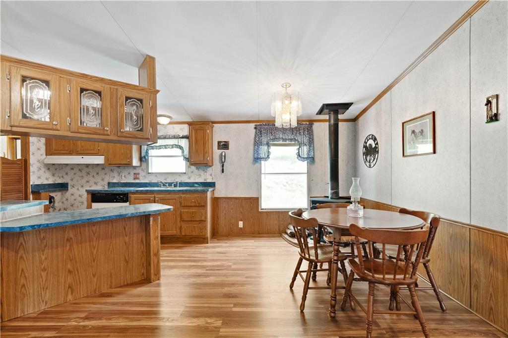 153 Wash Run Road White, PA 15490 - Photo 8 of 22 a dining hall with stainless steel appliances wooden floors and wooden floors