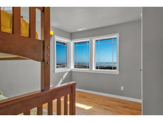 a hallway with a wooden floor