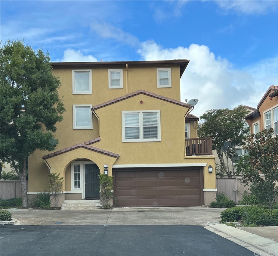 3 Botanical Irvine, CA 92618 - Photo 1 of 1 a front view of a house with a yard