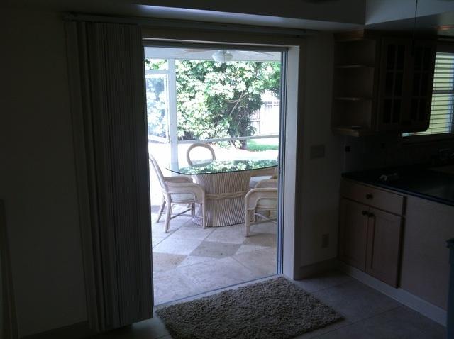401 Chevron Circle Jupiter, FL 33458 - Photo 21 of 22 Dining Area Leading To Porch