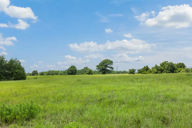 a view of a lake in front of a building