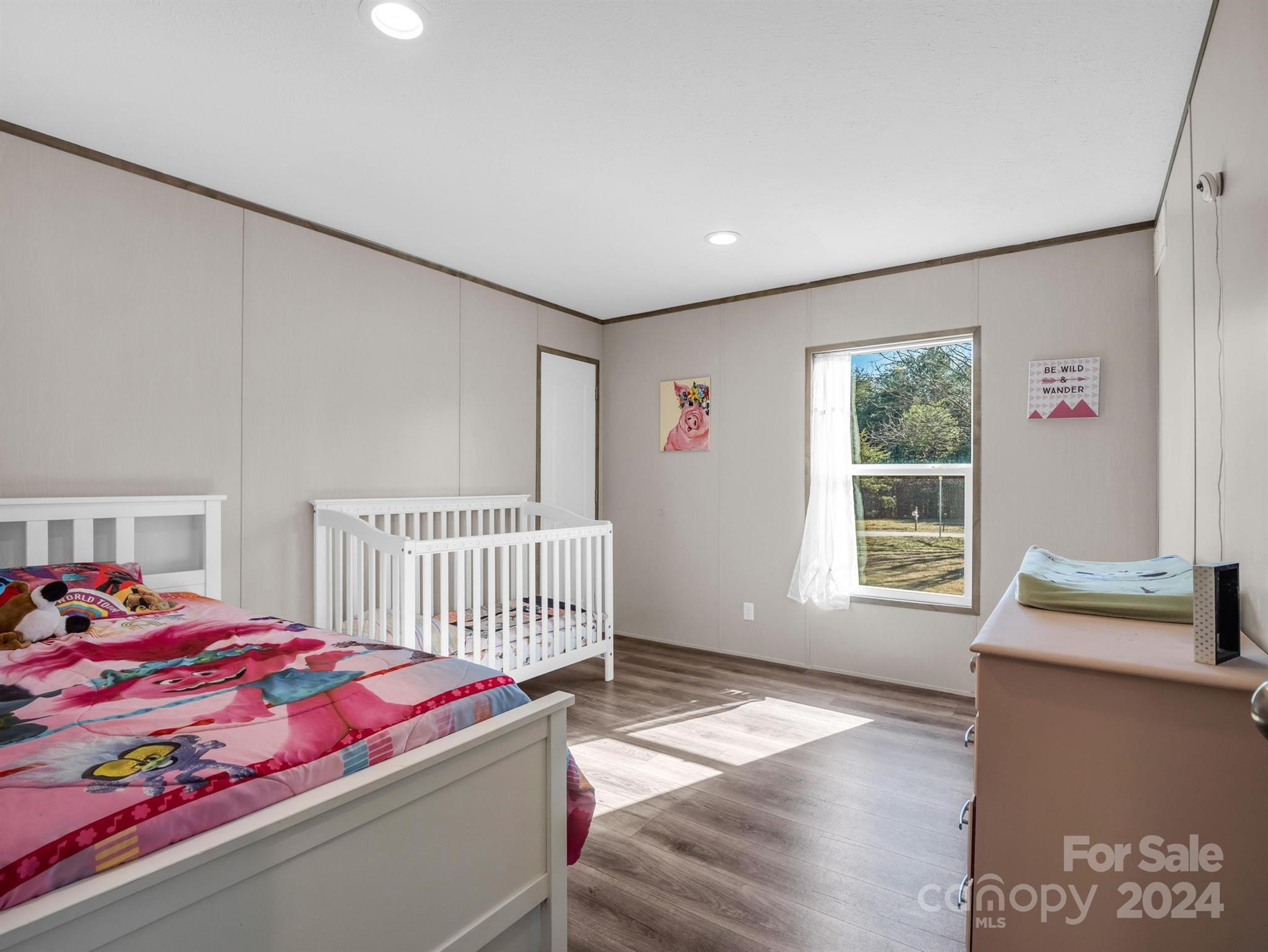 667 Salem Church Road Bostic, NC 28018 - Photo 29 of 34 a bedroom with a bed and a window