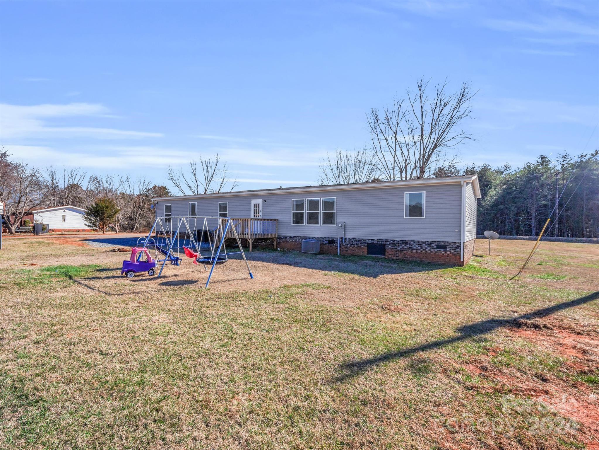 667 Salem Church Road Bostic, NC 28018 - Photo 33 of 34 a view of a house with a yard