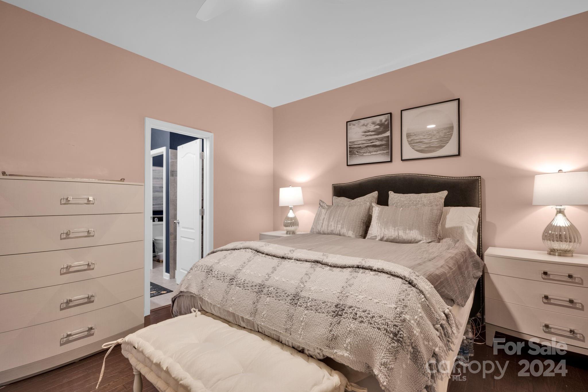 12834 Robert Walker Drive Davidson, NC 28036 - Photo 15 of 27 a bedroom with a bed and a dresser