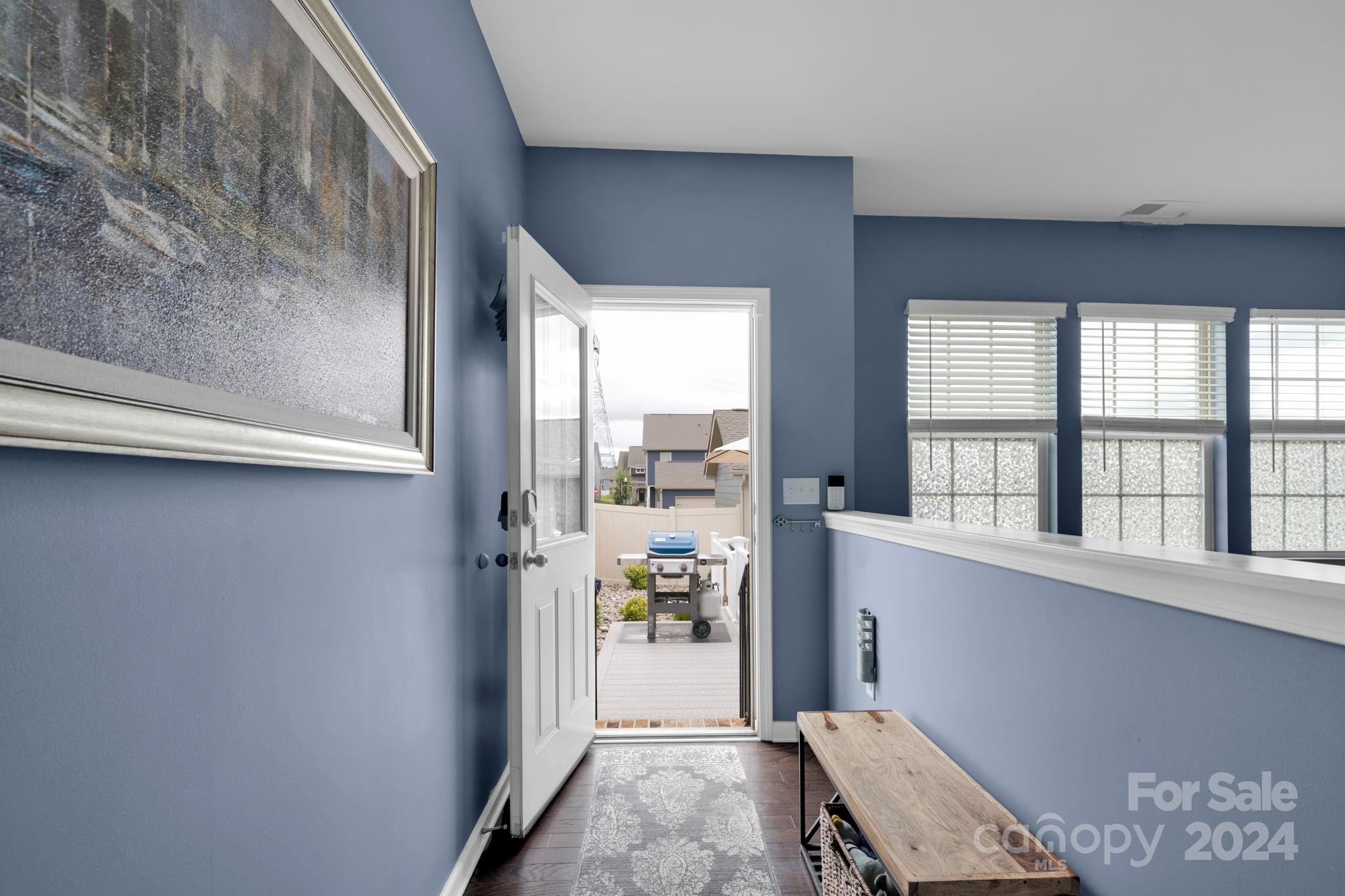 12834 Robert Walker Drive Davidson, NC 28036 - Photo 10 of 27 a view of a hallway with windows