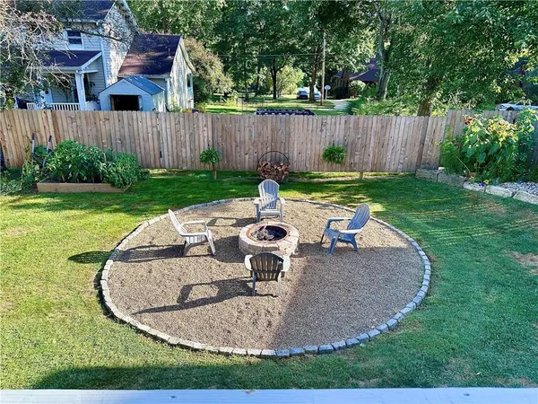 a garden view with a seating space