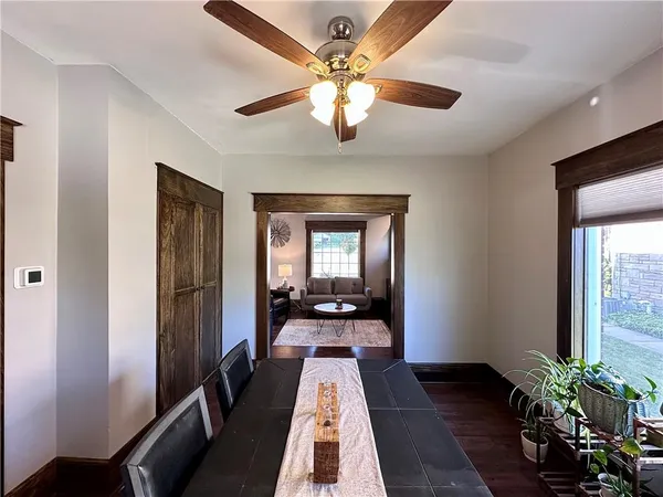 a view of a hallway with a chandelier