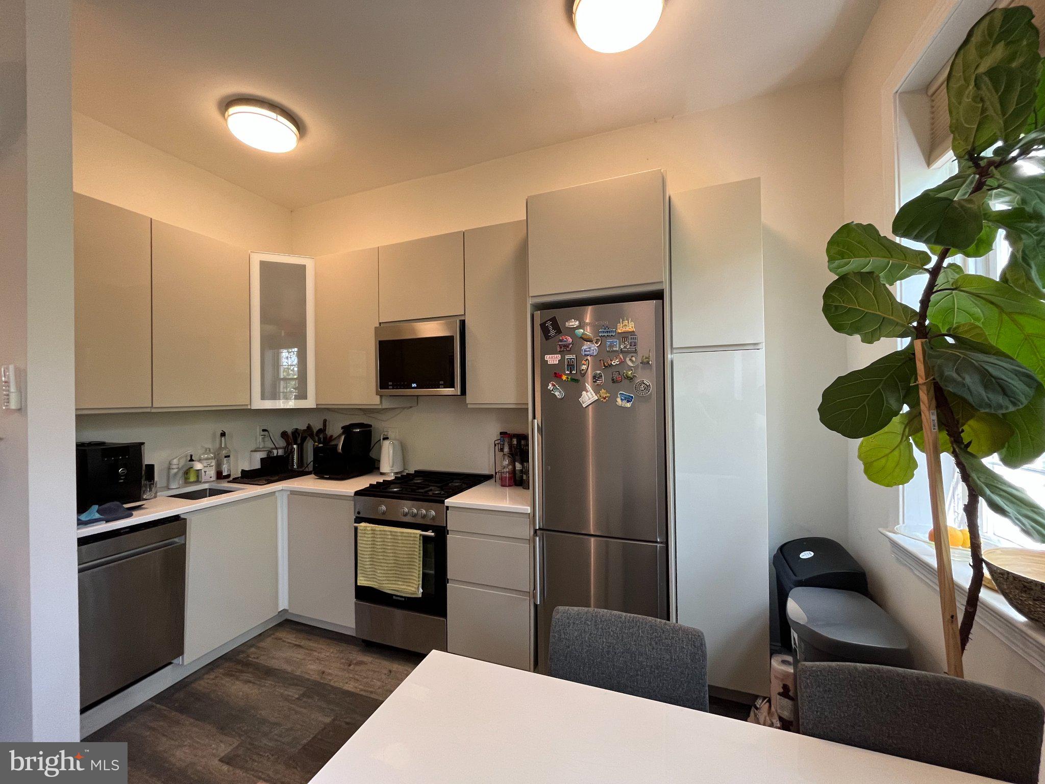 3003 P Street Northwest, Unit 400 Washington, DC 20007 - Photo 7 of 18 Modern kitchen with bright ambiance.