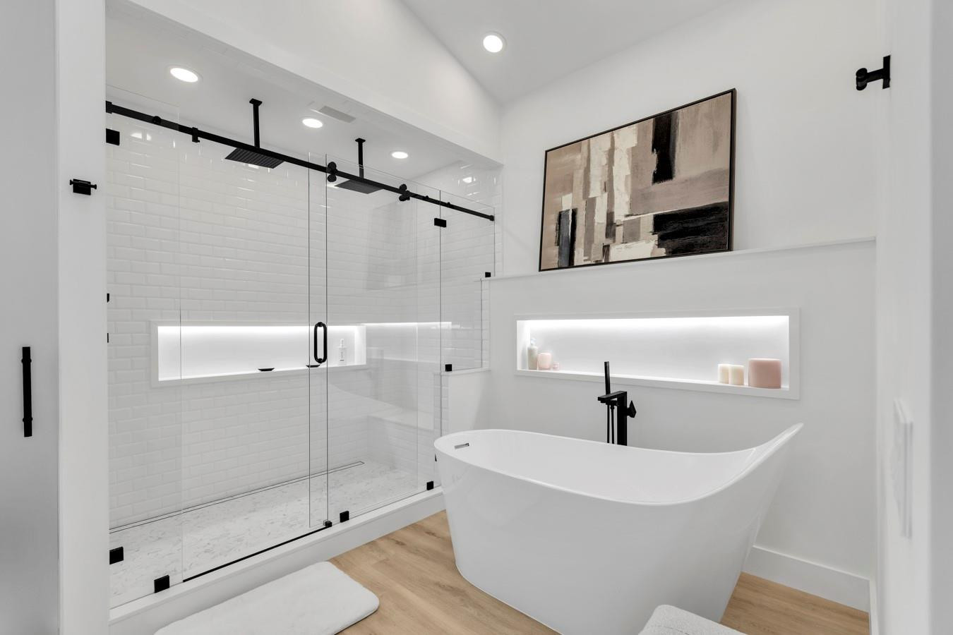 6391 Northwest 23rd Lane Boca Raton, FL 33434 - Photo 16 of 49 a bathroom with a bathtub and a shower