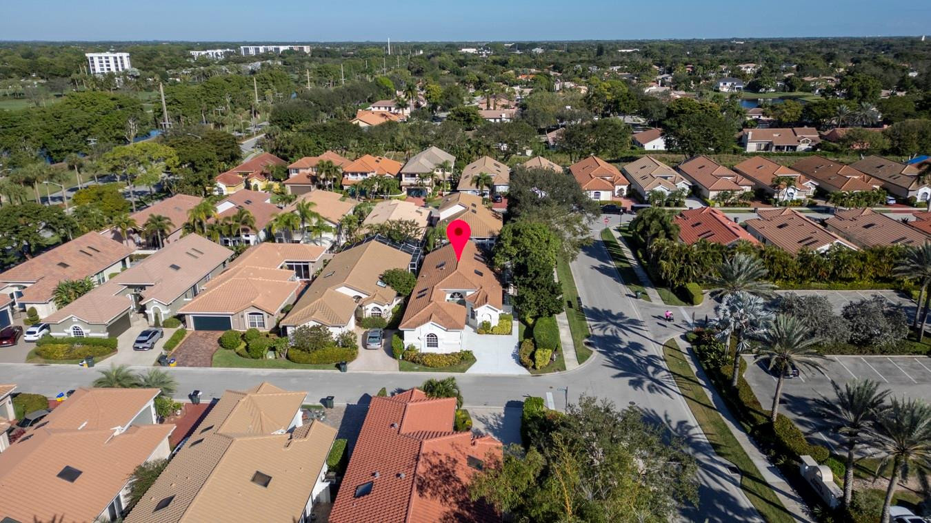 6391 Northwest 23rd Lane Boca Raton, FL 33434 - Photo 32 of 49 an aerial view of residential houses with outdoor space