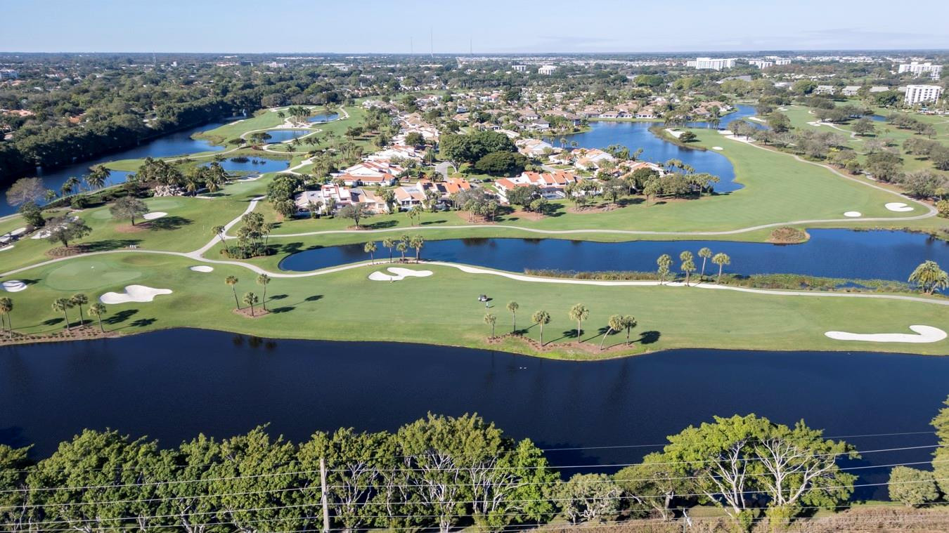 6391 Northwest 23rd Lane Boca Raton, FL 33434 - Photo 34 of 49 an aerial view of a house