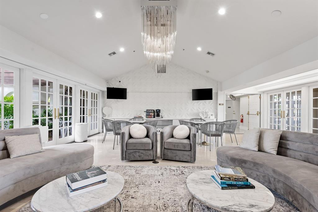 6391 Northwest 23rd Lane Boca Raton, FL 33434 - Photo 42 of 49 a living room with furniture and a large window