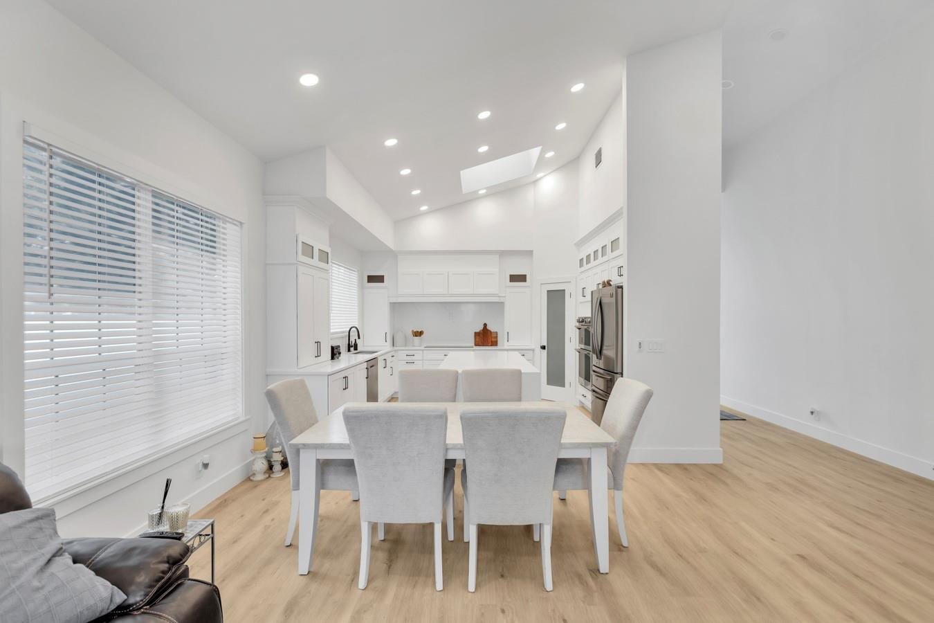 6391 Northwest 23rd Lane Boca Raton, FL 33434 - Photo 9 of 49 a view of a dining room with furniture and wooden floor