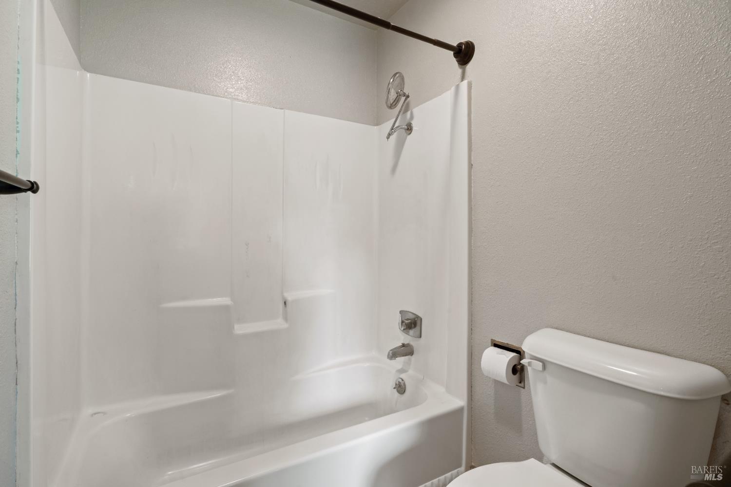 681 Branscomb Road Laytonville, CA 95454 - Photo 18 of 27 a bathroom with a shower and a toilet