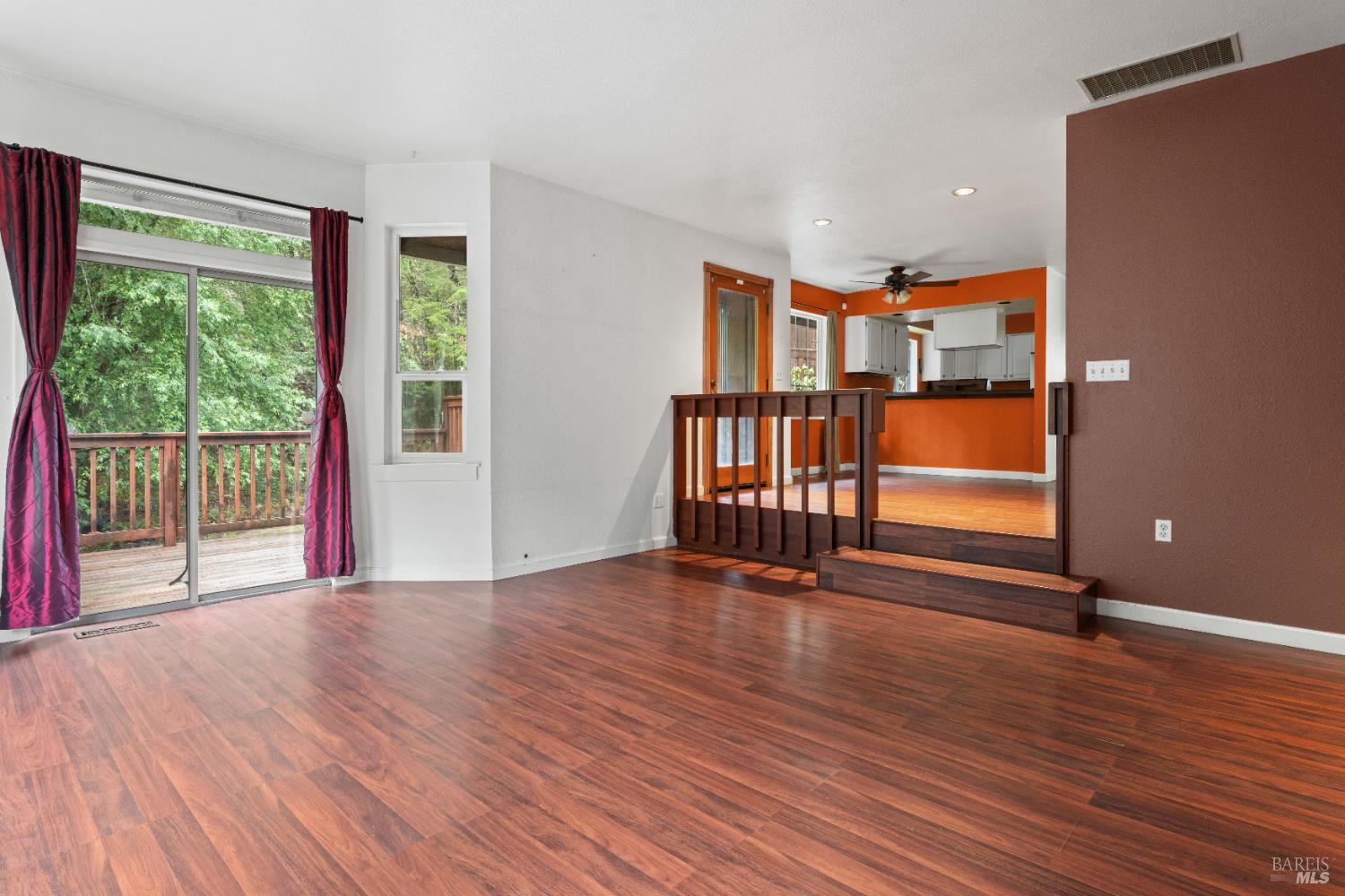 681 Branscomb Road Laytonville, CA 95454 - Photo 5 of 27 a view of empty room with wooden floor and fan