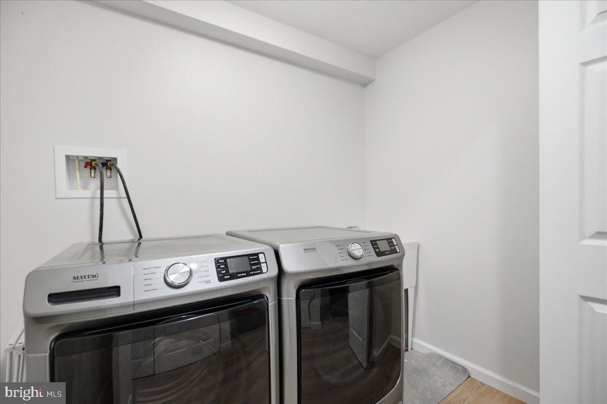 2424 Springbrook Court Huntingtown, MD 20639 - Photo 78 of 103 a utility room with dryer and washer