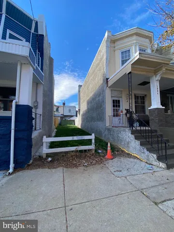 a view of a street with sitting area