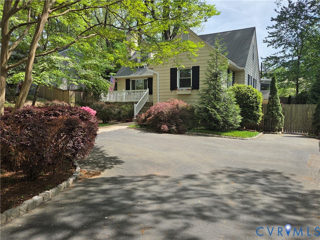 7733 Rock Creek Road Henrico, VA 23229 - Photo 1 of 73 a view of a house with a yard