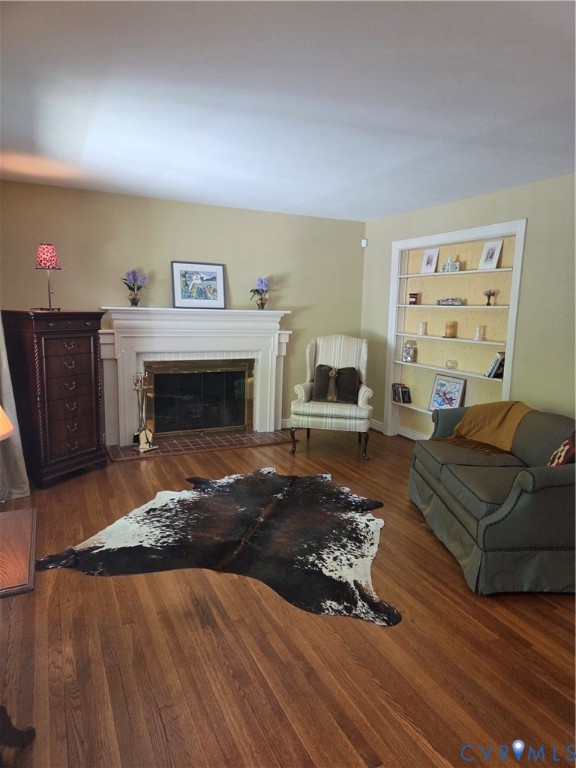 7733 Rock Creek Road Henrico, VA 23229 - Photo 11 of 73 a living room with furniture and a fireplace