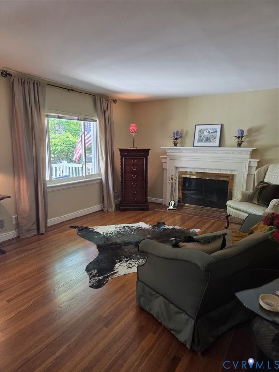 7733 Rock Creek Road Henrico, VA 23229 - Photo 12 of 73 a living room with furniture and a fireplace