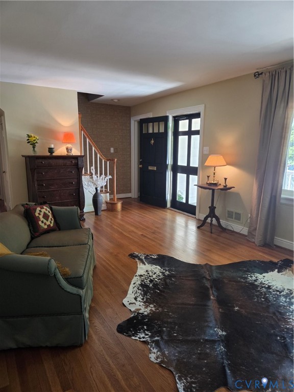 7733 Rock Creek Road Henrico, VA 23229 - Photo 13 of 73 a living room with furniture and a wooden floor