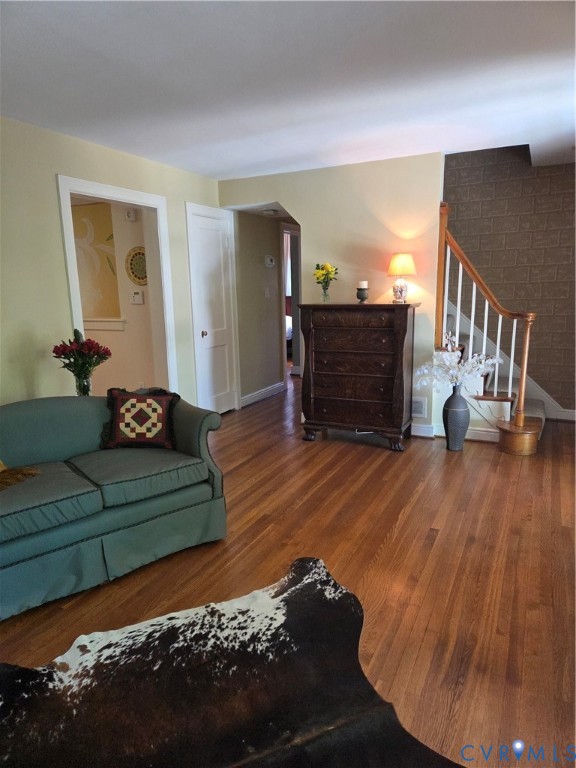 7733 Rock Creek Road Henrico, VA 23229 - Photo 14 of 73 a living room with furniture and a wooden floor