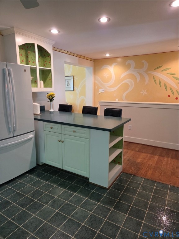 7733 Rock Creek Road Henrico, VA 23229 - Photo 18 of 73 a kitchen with a sink window and cabinets