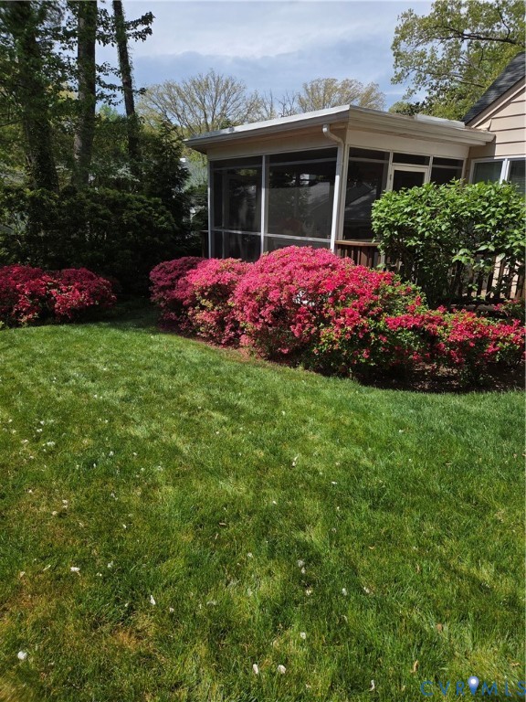 7733 Rock Creek Road Henrico, VA 23229 - Photo 33 of 73 a view of a backyard with potted plants and large tree