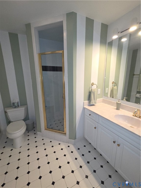 7733 Rock Creek Road Henrico, VA 23229 - Photo 45 of 73 a bathroom with a sink toilet and shower